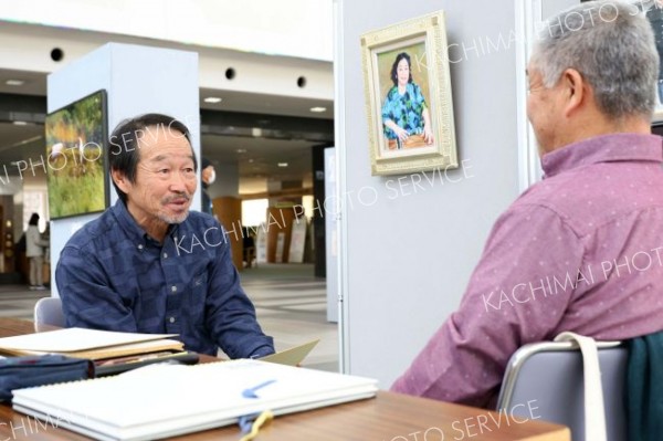 プロの画家による似顔絵体験が人気を集めた